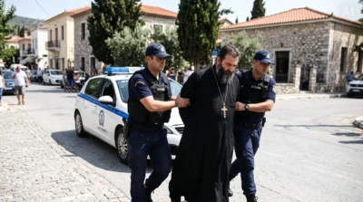 Român în haine clericale, ARESTAT în Grecia! Ce condamnare avea în România